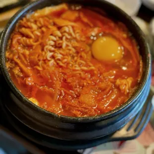 Large kimchi ramyon.  Spicy. This was perfect and I would this again except I will order it extra spicy.