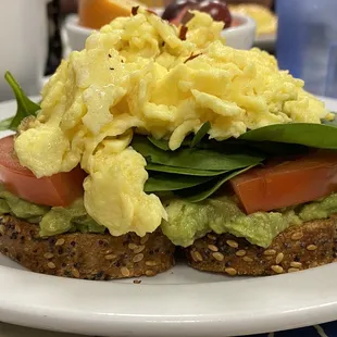 Everything toast, avocado, tomato, spinach, scrambled eggs
