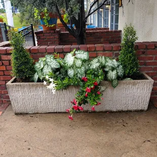 a planter with flowers in it