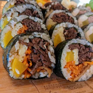 Bulgogi Kimbap. $6.99. Pickled radish, fishcake, egg, carrot, sesame leaf, bulgogi.