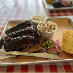 Half a rack rib plate. Six ribs and two sides plus cornbread