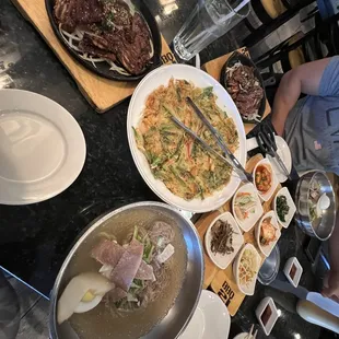 a table full of asian food