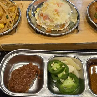 Banchan (side dishes) and dipping sauce for korean bbq