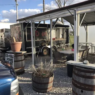 a bbq truck parked in a parking lot