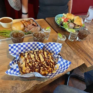 2 meat plate, 50/50 pulled pork fries, and a chicken sandwich
