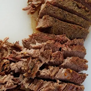 sliced meat on a cutting board