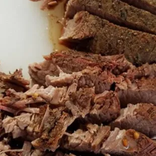 sliced meat on a cutting board