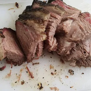 a piece of meat on a cutting board