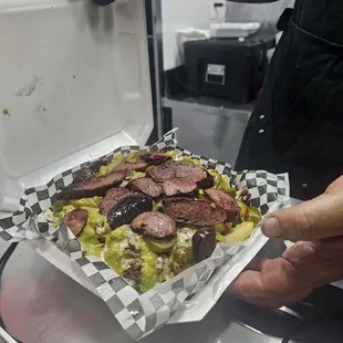 Loaded brisket french fries and added sausage.