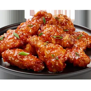 a plate of chicken wings
