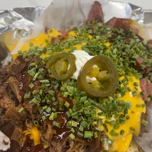 Fully loaded potato  w/ brisket and beef sausage (no pork)