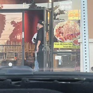 a man entering a restaurant