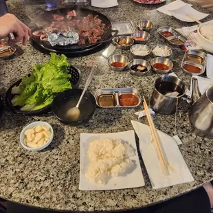 a group of people sitting around a table