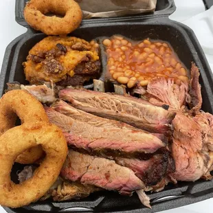 Brisket, pulled pork, ribs, baked beans, sweet potato casserole, hush puppies.