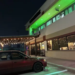 a car parked in front of the restaurant