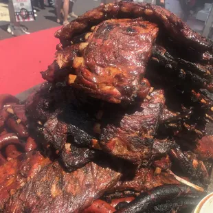 a large pile of barbecued meat