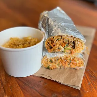 Chipotle mac and cheese ($6) and Smoked brisket burrito ($15) - chipotle coleslaw, crispy potatoes, Mexican cheese, red rice, chipotle mayo