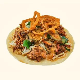 Pulled Pork Taco
mesquite smoked pulled pork, mexican cheese, fried onions, chipotle mayo, cilantro coleslaw, crispy jalapeños, bbq sauce