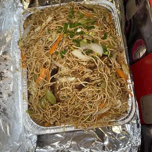 Charsiu fried noodles. I was shocked to see how big this was and it taste amazing.