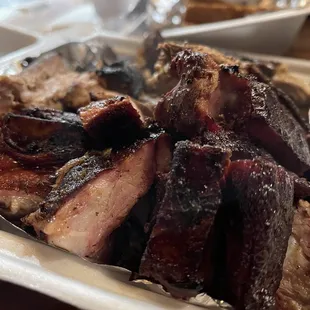 a plate of barbecued meat