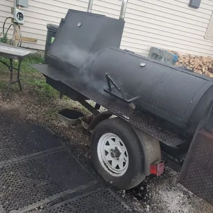 a bbq with a grill on it