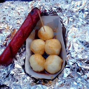 a hot dog and potatoes
