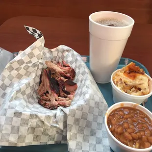 Pulled pork combination basket includes baked beans and hot potato salad.