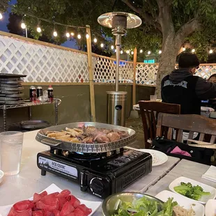 Outdoor seating,  only 2 tables left