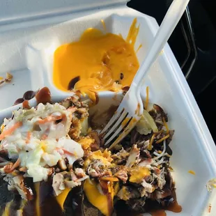 The smoked loaded potato is magic! I got the pulled pork on it. I think I just sinned--I ate the whole thing.