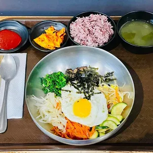 a bowl of food on a tray