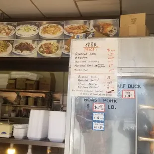 Glass case full of roast ducks &amp; chix. Takeout counter to the left.