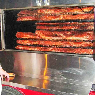 BRISKETS... Cooking 40 full briskets, 650 lbs,  at a time in Rotisserie Convection Smoker.