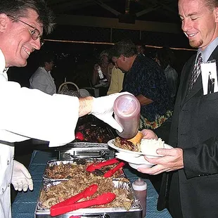 Staff Serving from Buffet Line