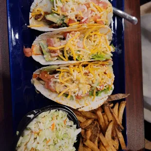 Pulled pork tacos with fries and coleslaw
