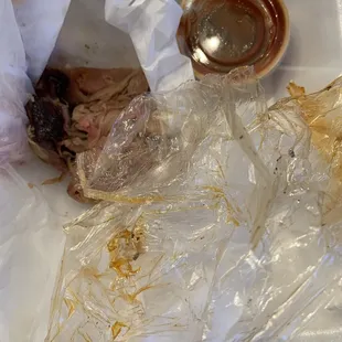 Plastic wrap that was around the 4 ribs and a pile of meat which appeared to be pork. Not the 5 ribs that were ordered.