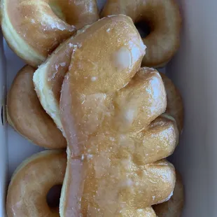 a box of glazed donuts