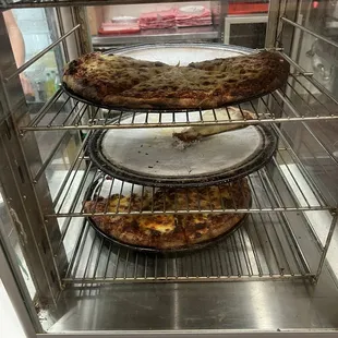 two pizzas in the oven