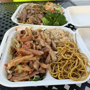 Chicken teriyaki, yakisoba, brown rice &amp; stir fry salad.  Pork, broccoli and mixed salad