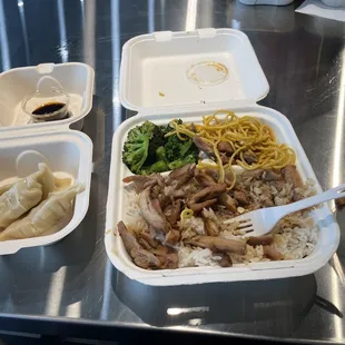 Chicken teriyaki with steamed broccoli, chow mein, white steamed rice, side of gyoza, and a lemonade.