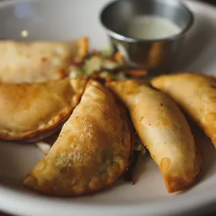 a plate of empanadas