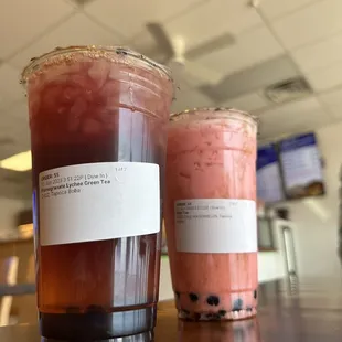 two cups of bubble tea on a table