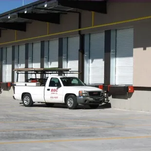 Overhead garage roll up doors and dock equipment