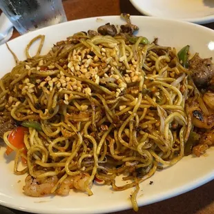 a plate of stir fried noodles