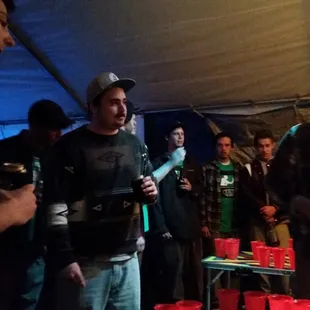 More action from the 2014 Bong Pong tournament.  It was free to sign up. Shirts, prizes, food and great times were had by all.