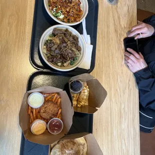  a person taking a picture of their meal