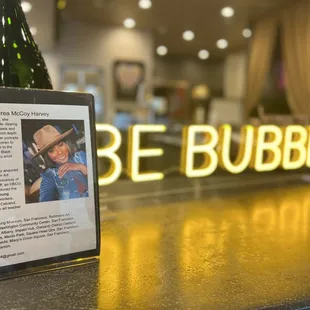 a bottle of wine on a bar