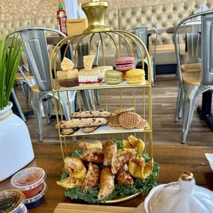 Afternoon tea bites: mini cakes, macrons, finger cookies, stroopwafels, dumplings, crab rangoons, and egg rolls