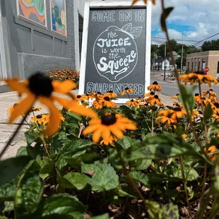 a sign in front of a store