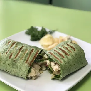a chicken and spinach wrap