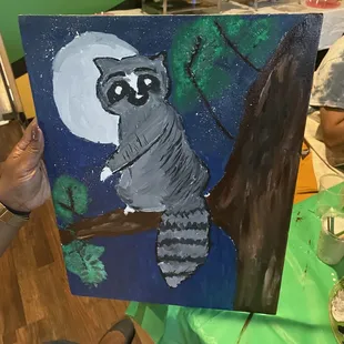 Completed by one of our dear patrons at Wild Side 2023. Doesn't this racoon look like they're up to something?